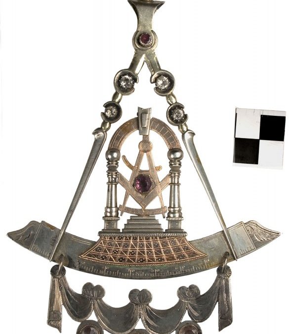 Antique artifact of William Cuscaden's Jewel.